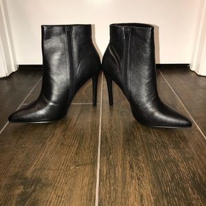 Fashion Nova Booties in color Black